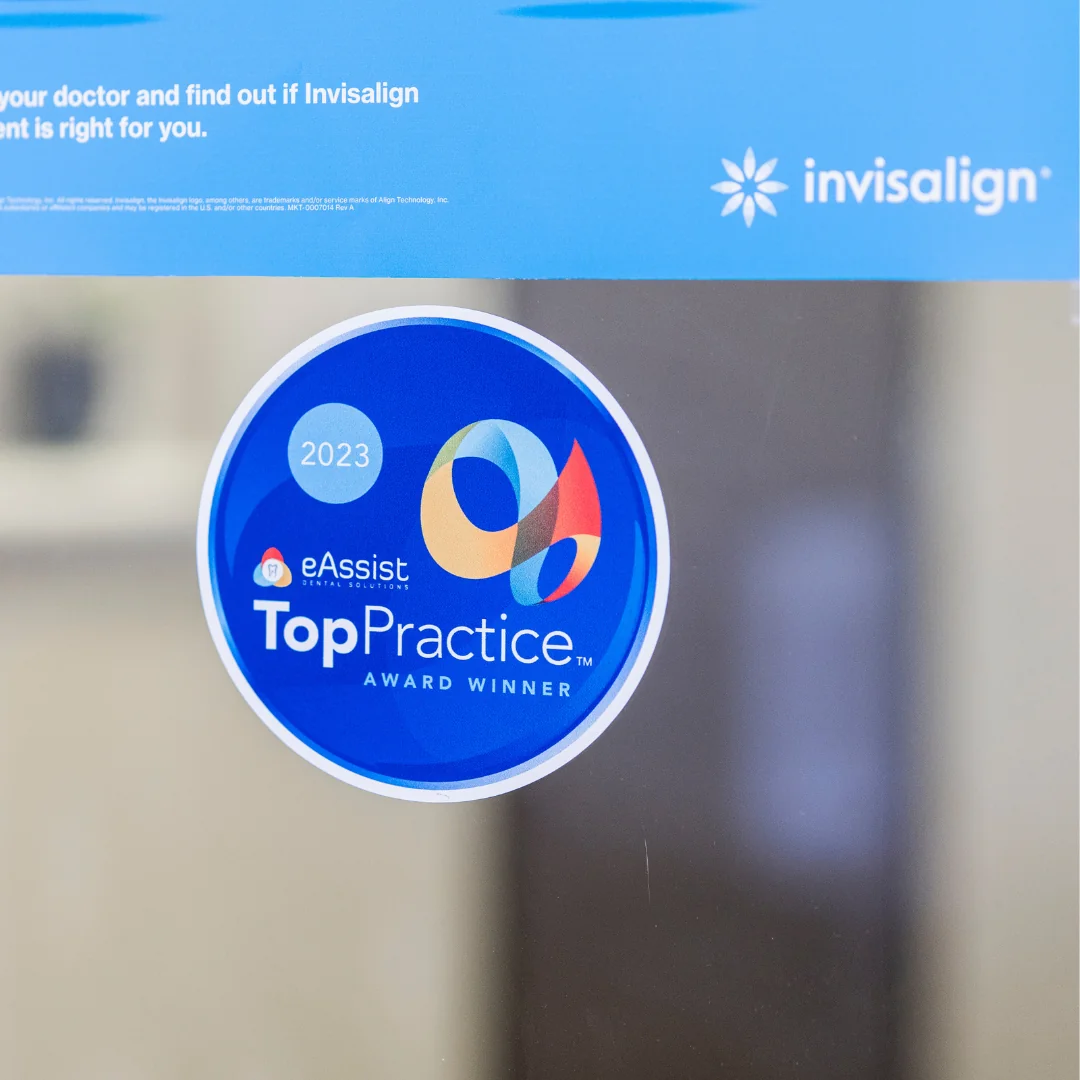 Invisalign provider and 2023 Top Practice award decals